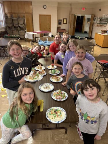 Elementary Students With Gingerbread Houses Elementary Students With Gingerbread Houses
